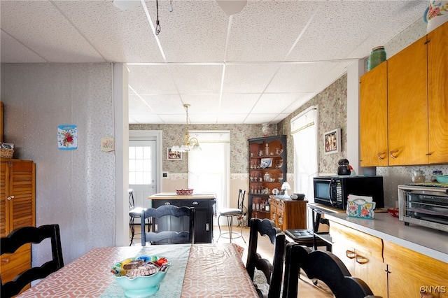 dining room featuring a paneled ceiling