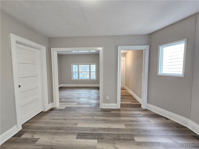 empty room featuring wood-type flooring