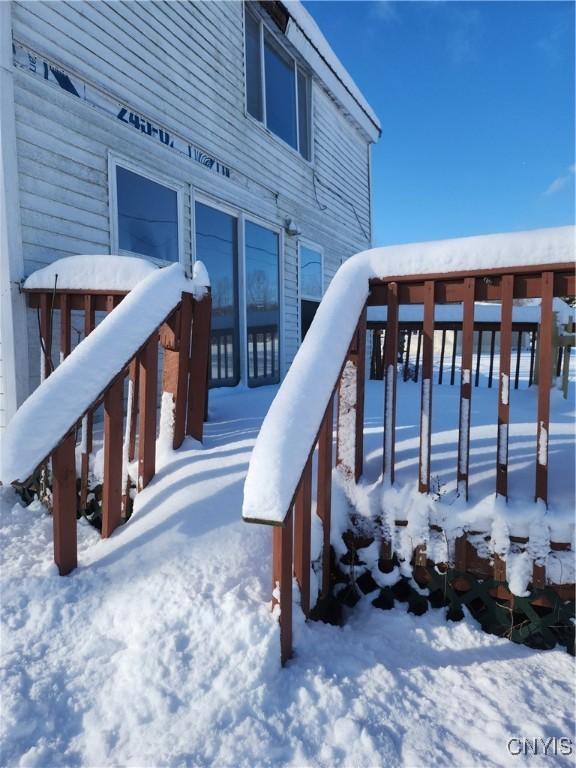 view of snow covered deck