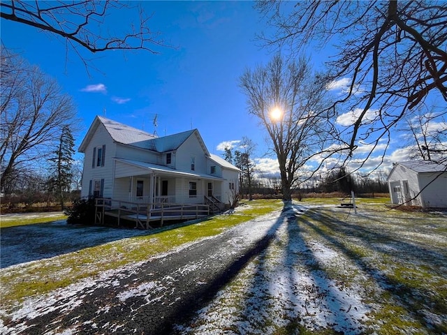 view of property exterior with a porch