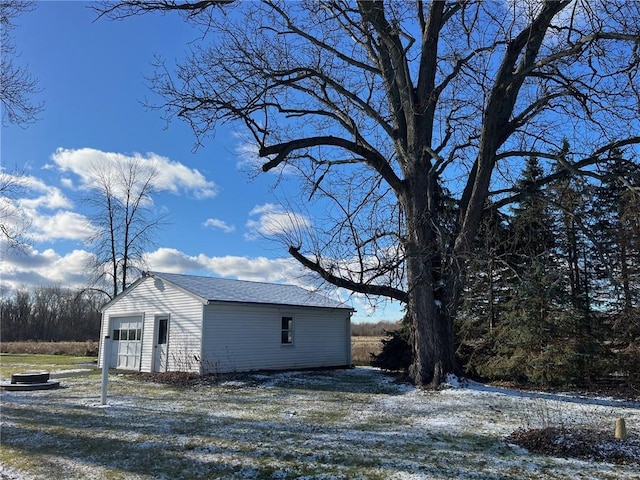 view of outbuilding with a garage