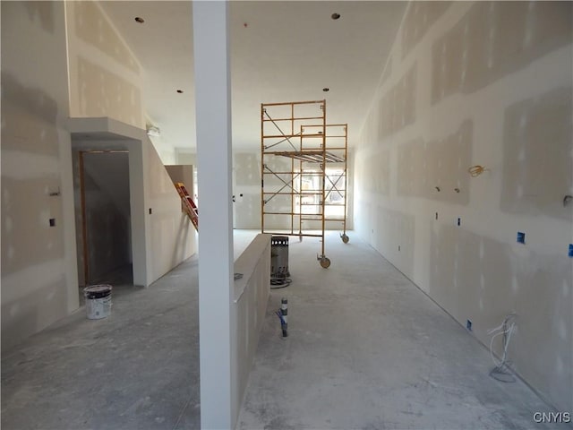 spare room featuring concrete flooring