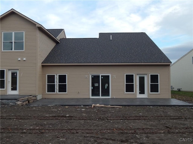 back of property featuring a patio