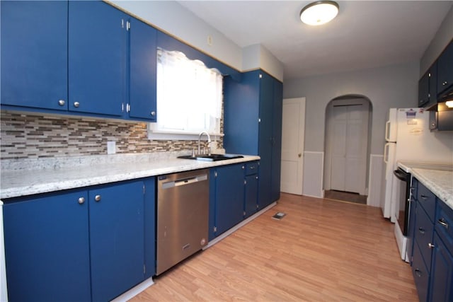 kitchen with stainless steel dishwasher, white range with electric cooktop, and blue cabinetry