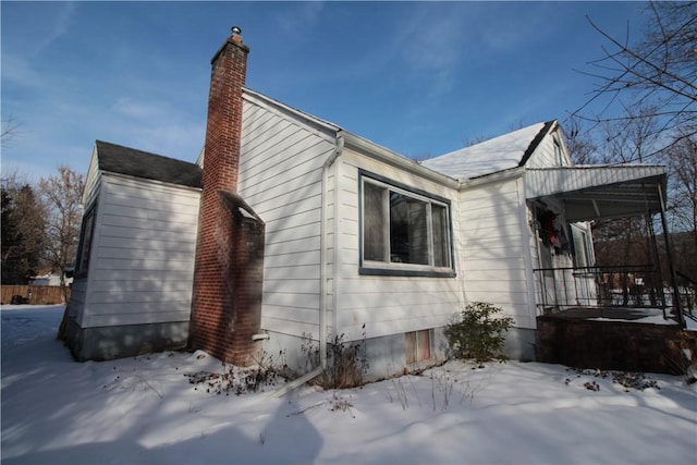 view of snow covered property