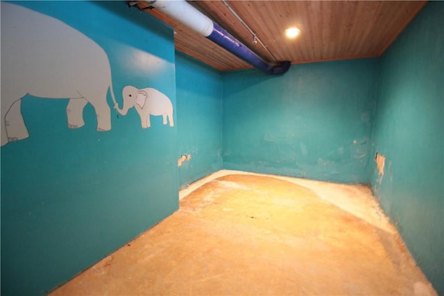 basement featuring wooden ceiling