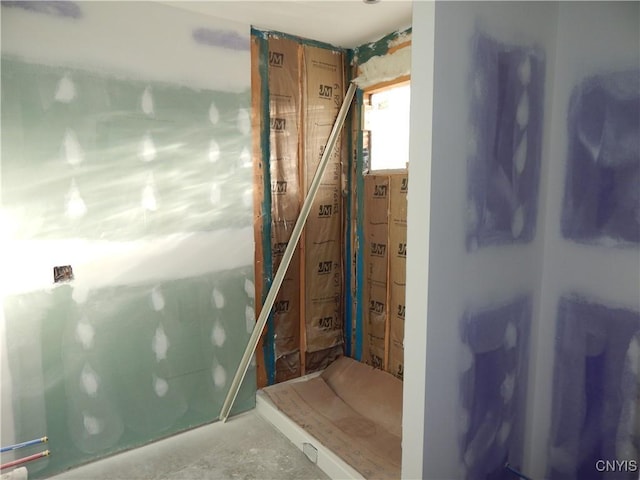 stairs with concrete floors