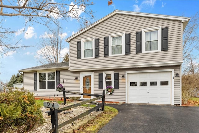 view of front of property with a garage