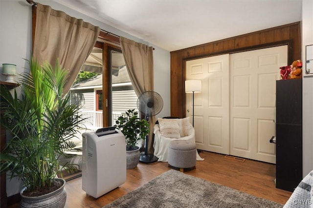 sitting room featuring wood-type flooring