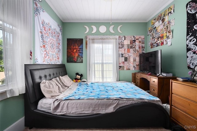 bedroom with ornamental molding