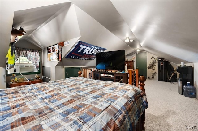 bedroom with carpet, vaulted ceiling, and cooling unit