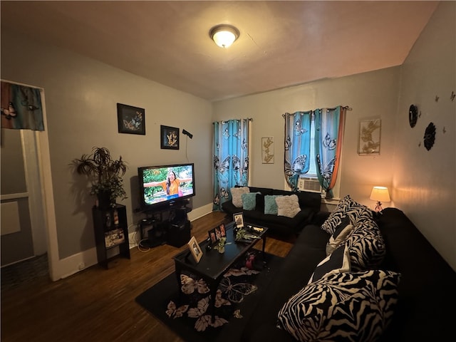 living room with dark hardwood / wood-style flooring