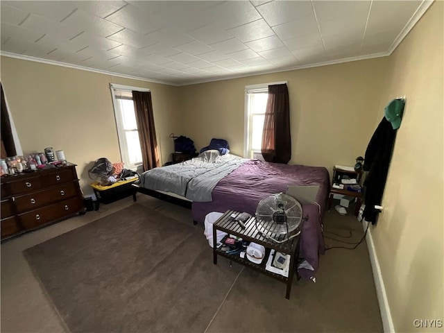 bedroom featuring crown molding