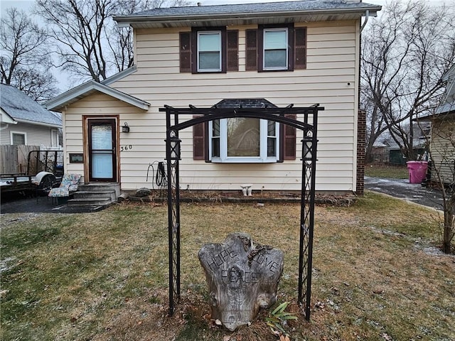 view of front of home with a front lawn