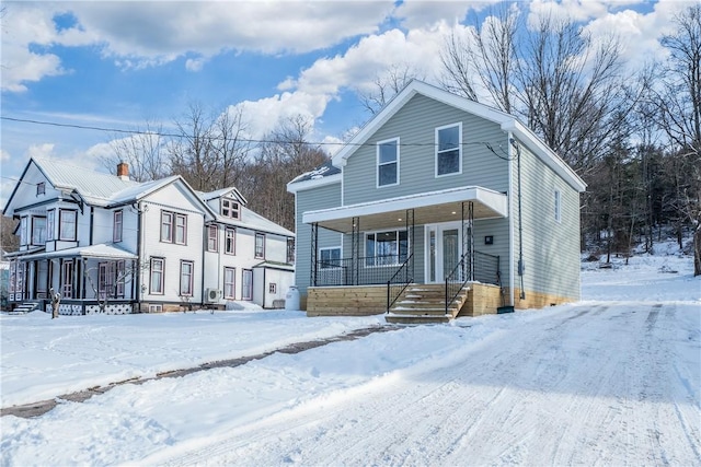 view of front of home featuring covered porch