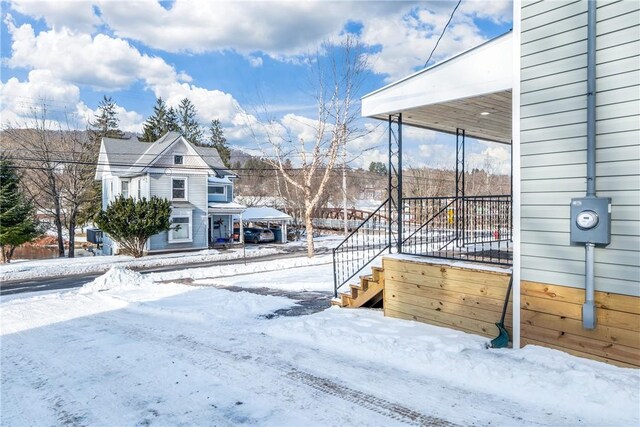 view of yard covered in snow