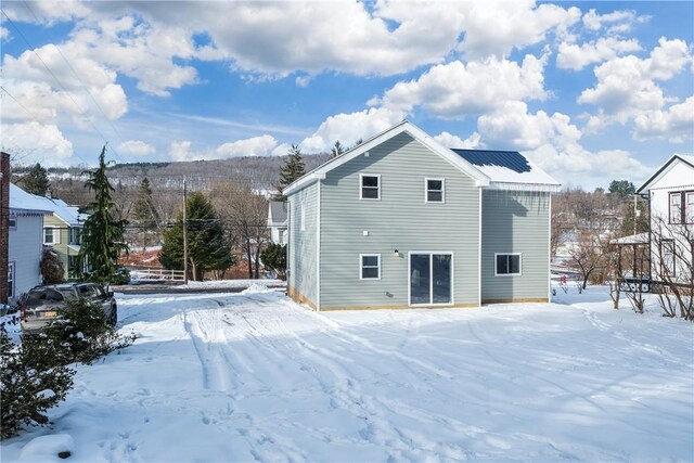 view of snow covered property