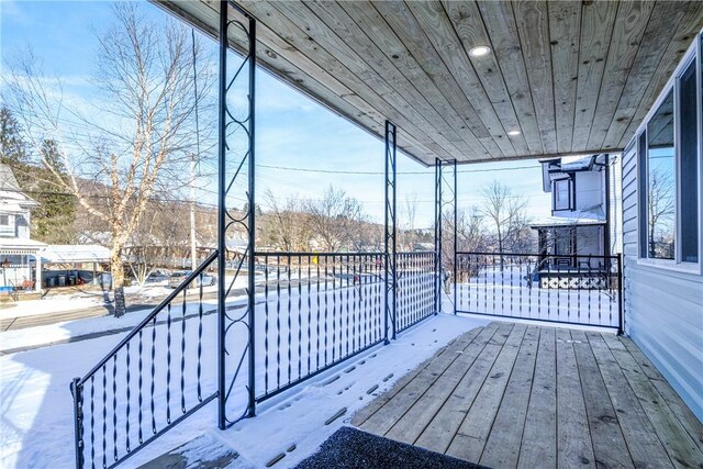 view of snow covered deck