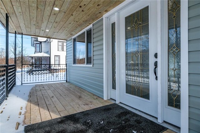 entrance to property with covered porch