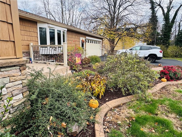 view of property exterior featuring a garage