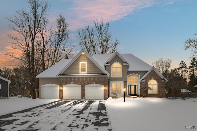 view of front of home with a garage