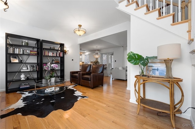 sitting room featuring light hardwood / wood-style flooring