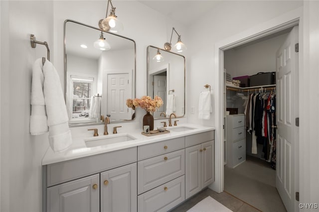 bathroom featuring tile patterned floors and vanity