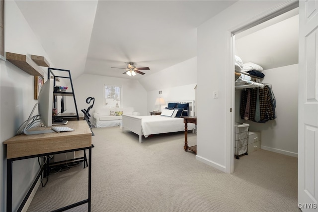 bedroom featuring ceiling fan, carpet floors, and lofted ceiling