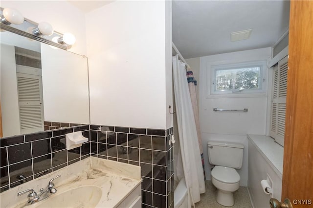 full bathroom with decorative backsplash, vanity, shower / bathtub combination with curtain, tile walls, and toilet