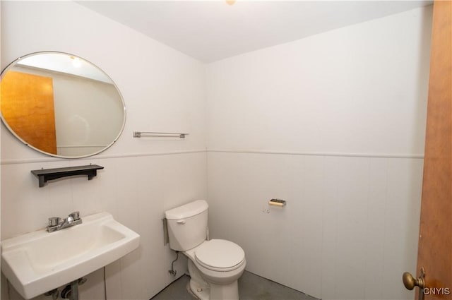 bathroom with toilet and sink