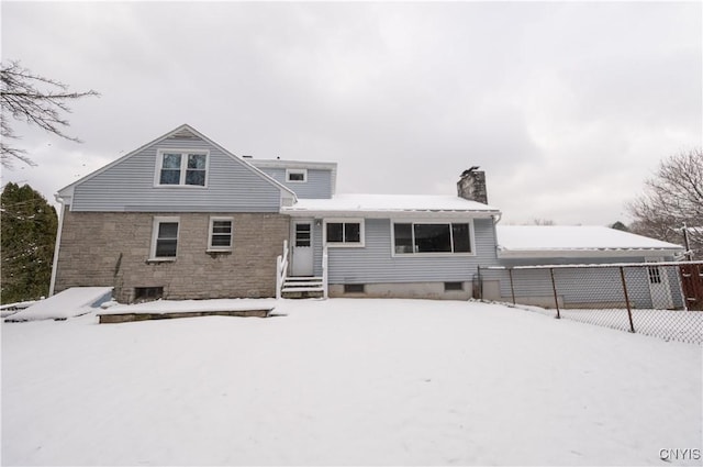 view of snow covered property