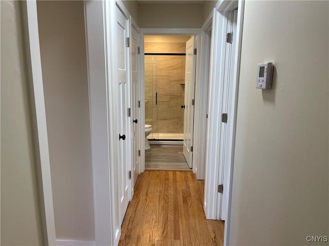 hall featuring light wood-type flooring