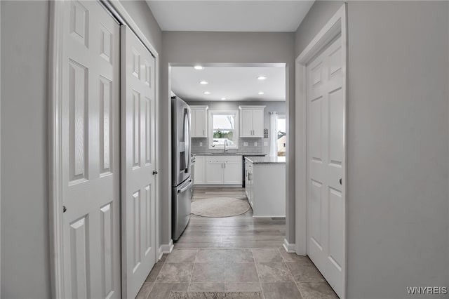 hallway featuring sink