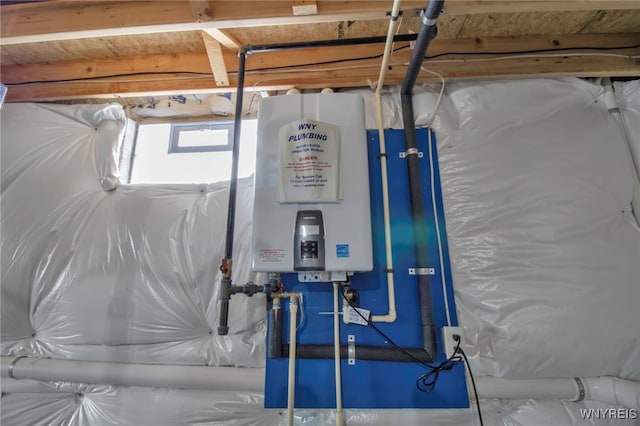 utility room featuring water heater