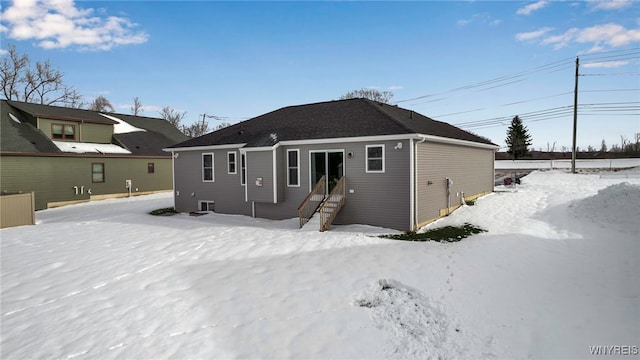 view of snow covered house