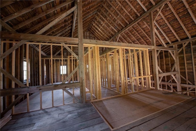 misc room with vaulted ceiling with beams, hardwood / wood-style flooring, and wooden ceiling