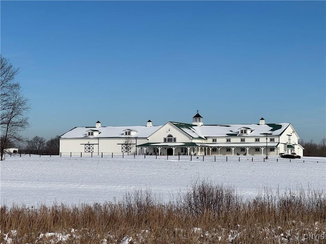 view of snow covered property