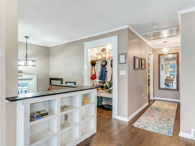 hall with crown molding and hardwood / wood-style flooring