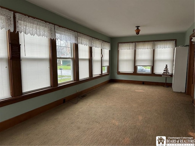 view of unfurnished sunroom