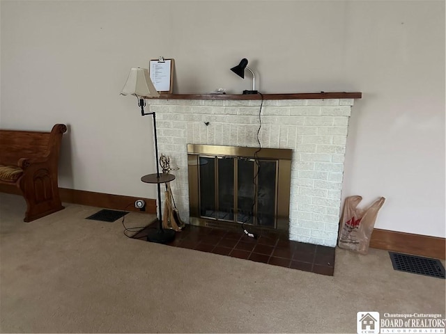 interior details featuring carpet flooring and a fireplace