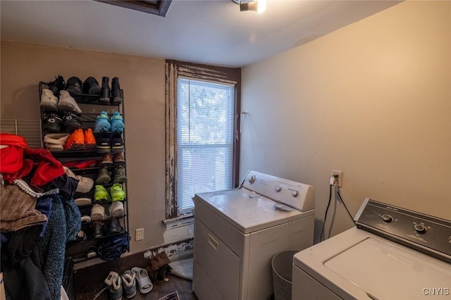 washroom featuring washer and dryer