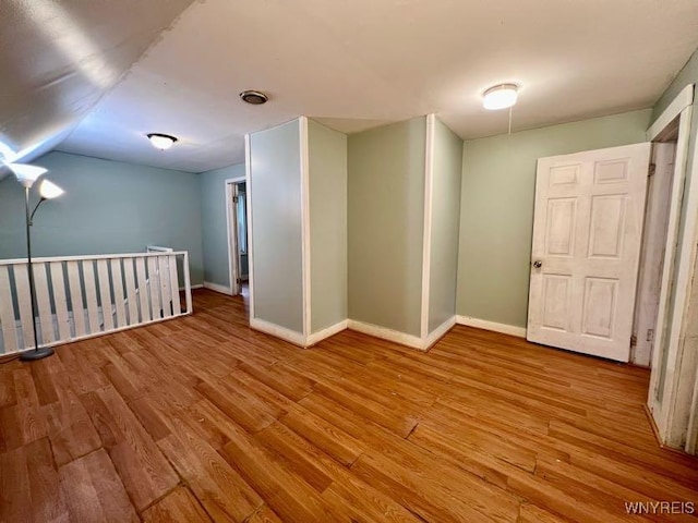 unfurnished room with light hardwood / wood-style floors