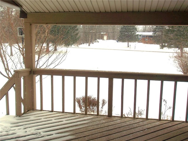 view of snow covered deck