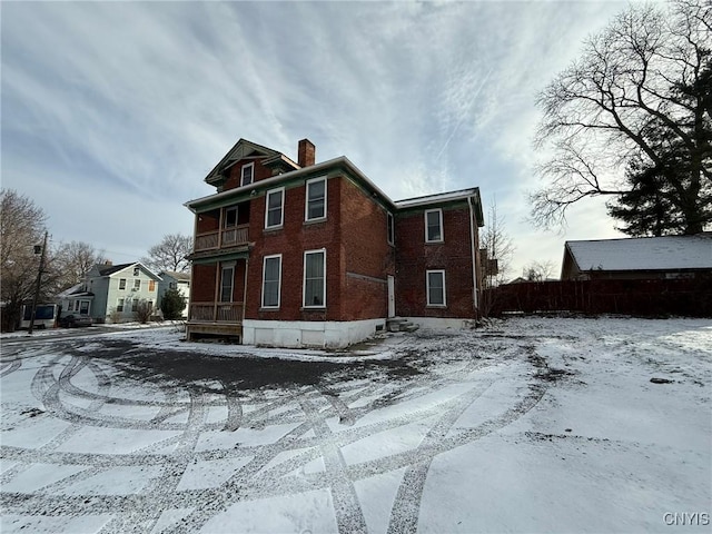 view of snow covered property