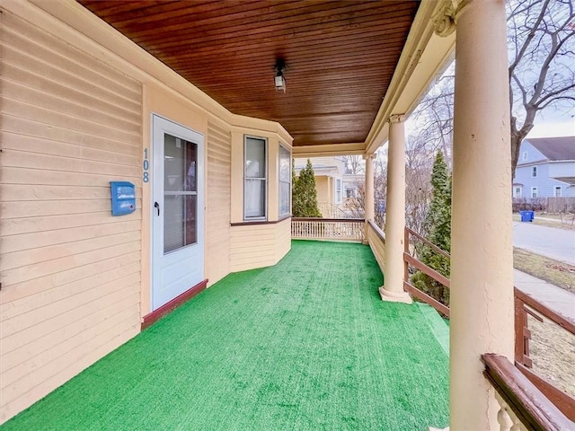 exterior space with wood ceiling