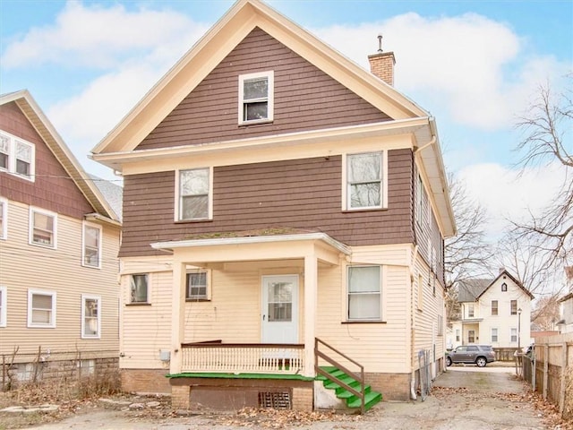 back of house with a porch