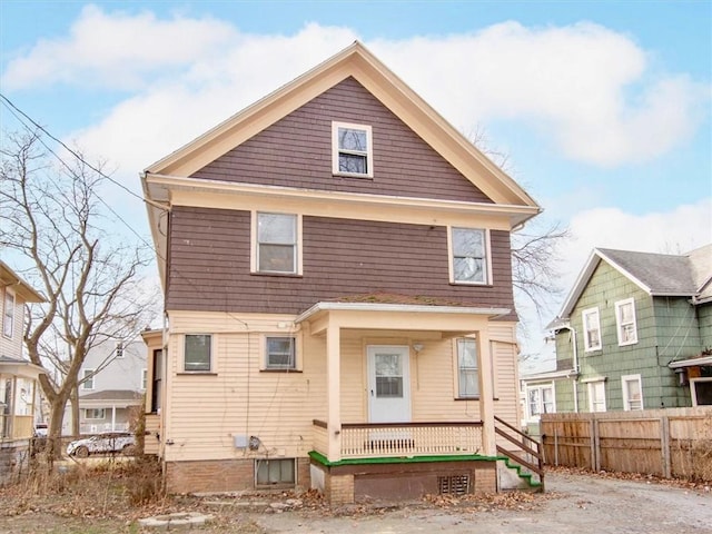 back of house with covered porch