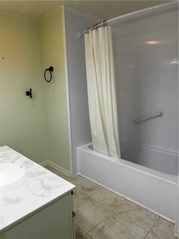 bathroom with tile patterned floors, shower / bath combination with curtain, and vanity