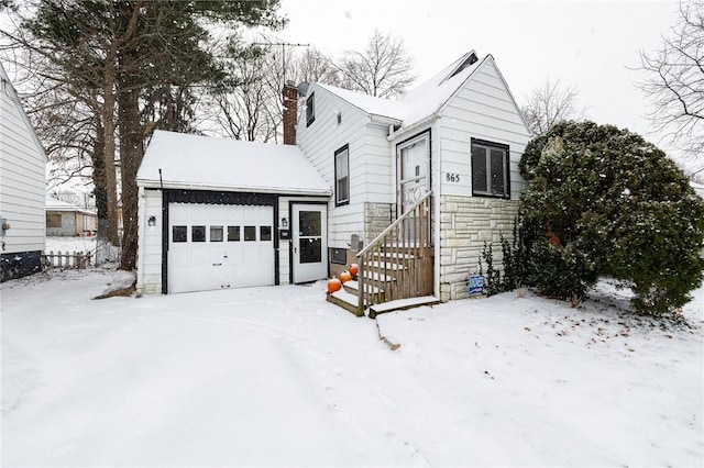 view of front of home with a garage