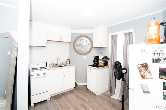 kitchen with white appliances, crown molding, sink, white cabinets, and light hardwood / wood-style floors